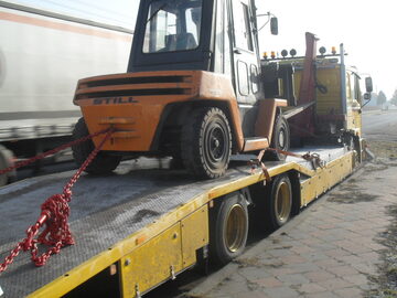 Transport maszyn ciągników Pomoc Drogowa Wolsztyn Leszno Kościan 