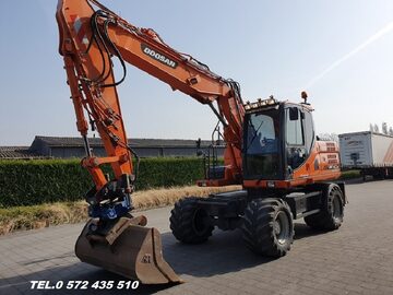 MOBILNA Koparka kołowa Doosan DX140W3.. .