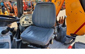 KOPARKO LADOWARKA JCB 4CX  NA ROWNYCH KOLACH