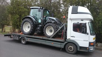 Transport maszyn rolniczych i budowlanych uslugi transportowe