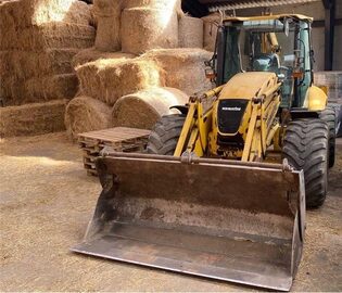 Koparko ladowarka Komatsu WB 97S-5 